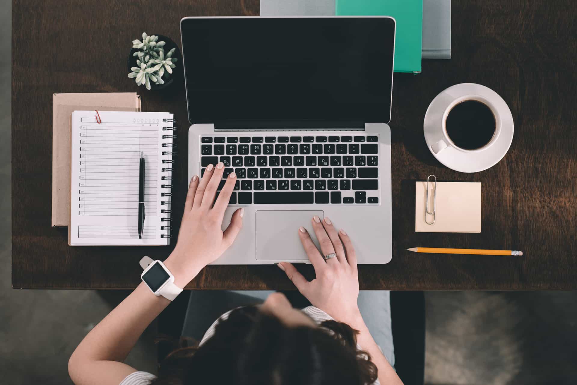 A woman searches for her website's rankings on Google.